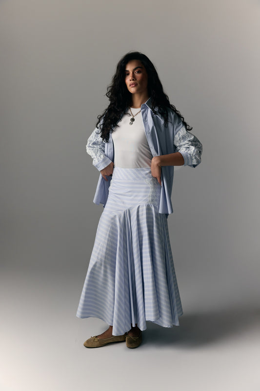Model wearing Blue Pinstripe Shirt-Jacket & Trumpet Skirt Set — view 1, Doha Zaitoon