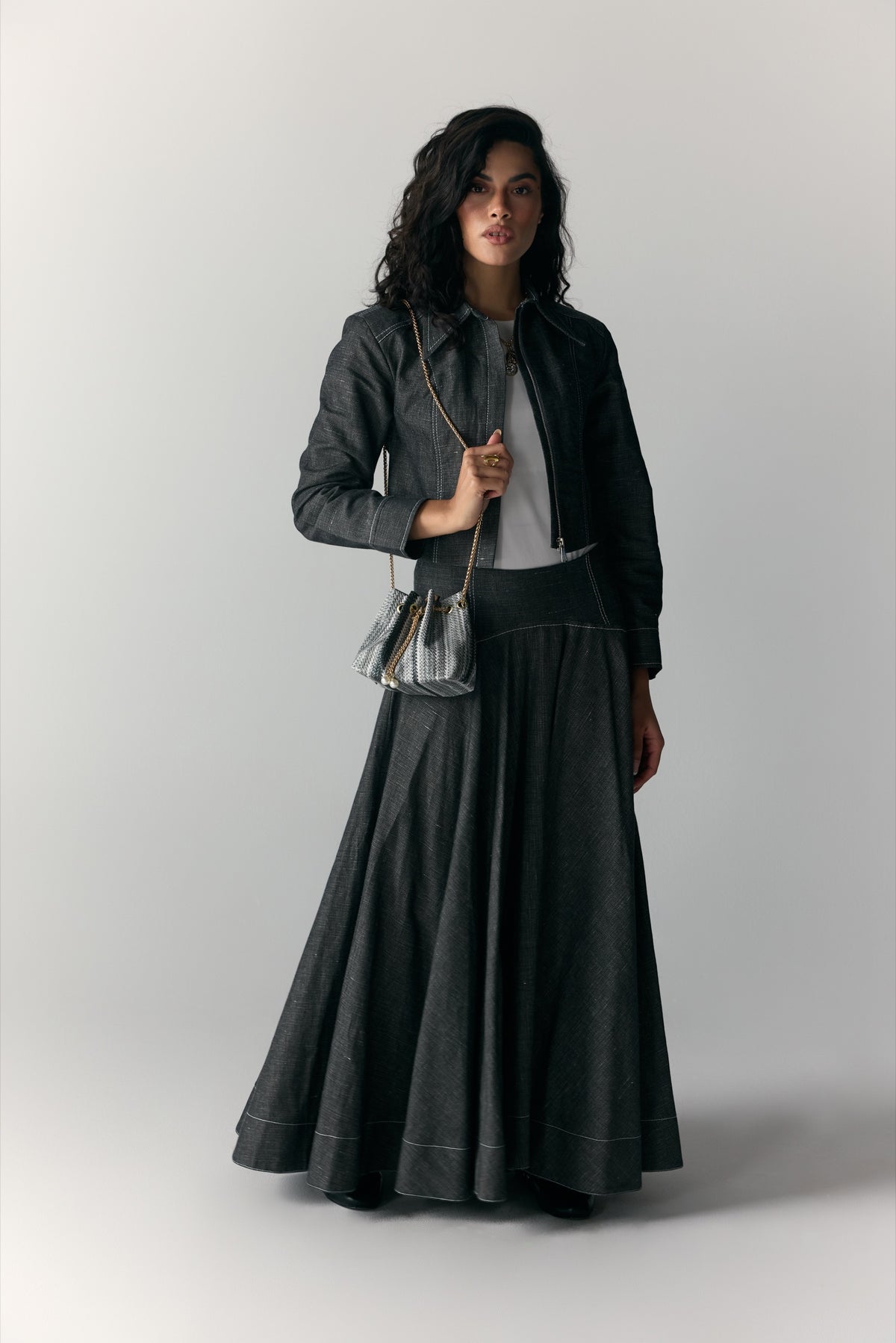 Model wearing Charcoal Denim Moto Jacket & Maxi Skirt — view 1, Doha Zaitoon
