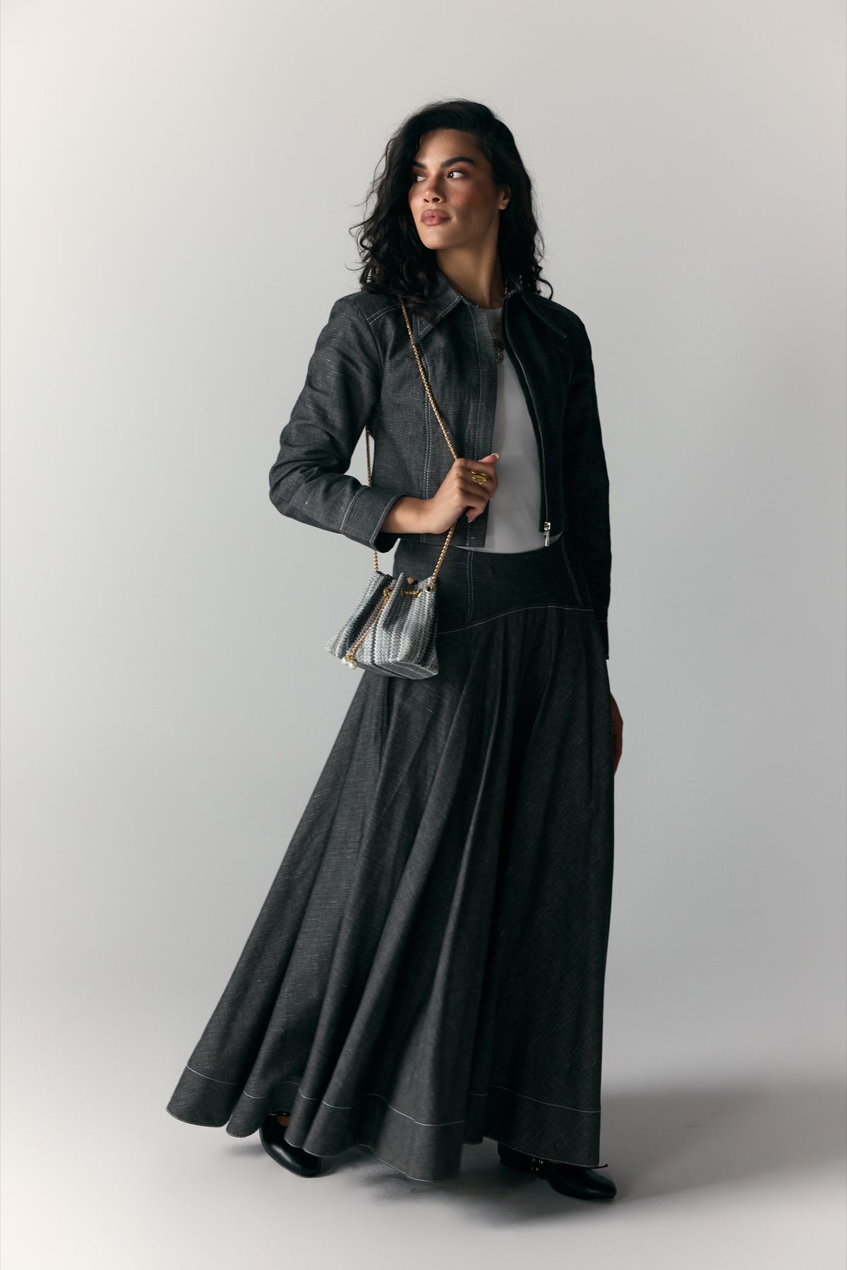 Model wearing Charcoal Denim Moto Jacket & Maxi Skirt — view 2, Doha Zaitoon