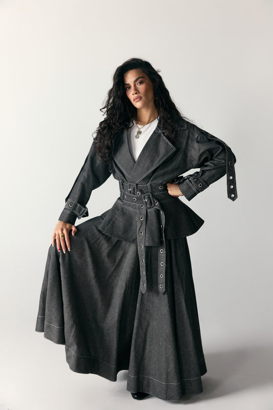 Model wearing Charcoal Grommet Peplum Jacket & Maxi Skirt — view 1, Doha Zaitoon