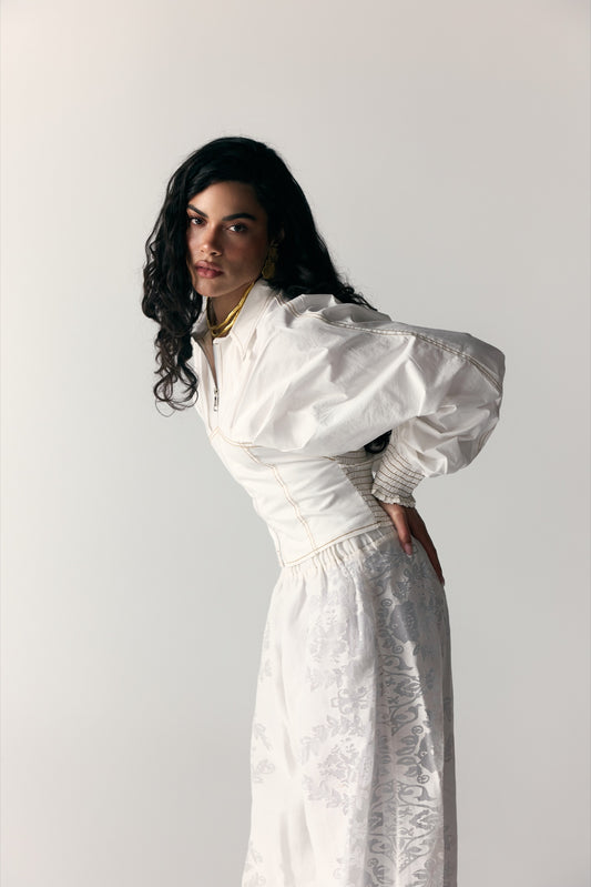 Model wearing White Blouse with Yellow-Trim Leg-of-Mutton Sleeves & White Skirt — view 1, Doha Zaitoon