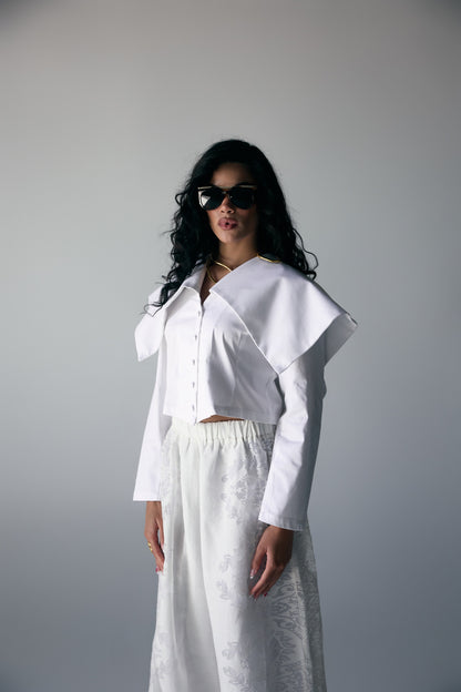 Model wearing White Origami-Collar Cropped Jacket & Jacquard Wide-Leg Trousers — view 3, Doha Zaitoon